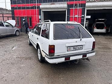каропка нубира: Nissan Bluebird: 1990 г., 2 л, Механика, Дизель, Универсал — 2