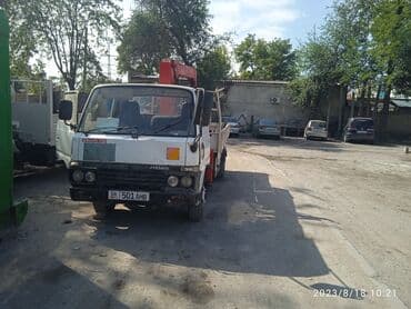 купить грузовой автомобиль с манипулятором бу: Манипулятор, Nissan, 1986 г. — 4