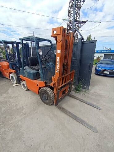 Погрузчик, Nissan, 2005 г., Колесный, Вилочный