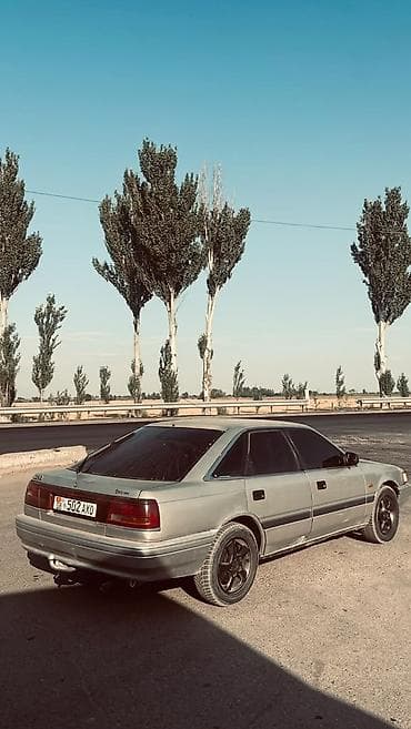 Mazda 626: 1989 г., 2 л, Кол менен иштөөчү, Лифтбек — 1