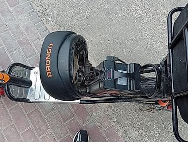 дрон грузовой: Электроскутер DRONGO с грузовой корзиной и задней платформой — 5