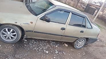 Daewoo Nexia: 2006 г., Механика, Седан — 3