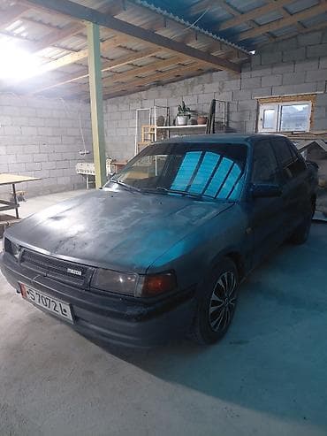 кызыл бирдик: Mazda 323: 1989 г., 1.6 л, Кол менен иштөөчү, Бензин, Седан — 5