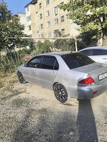 grand cherokee: Mitsubishi Lancer: 2007 г., 1.6 л, Автомат, Седан — 8