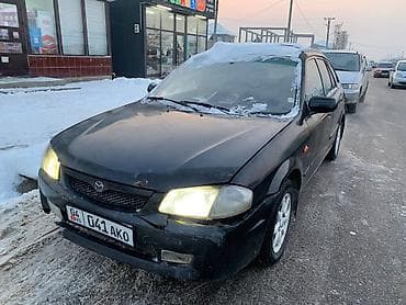 Mazda 323: 2000 г., 1.8 л, Механика, Бензин, Универсал