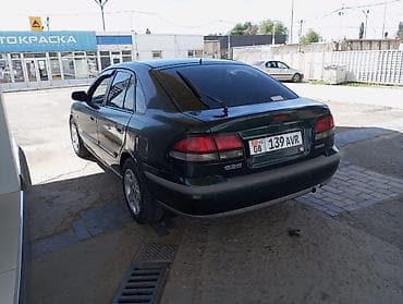 Mazda 626: 1998 г., 1.8 л, Механика, Бензин, Седан