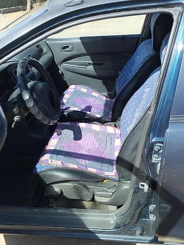 lexus es300 2002: Mazda 323: 1996 г., 1.5 л, Автомат, Бензин, Седан — 5