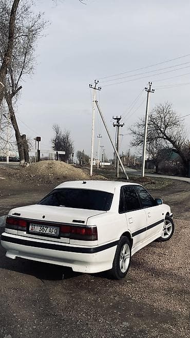 бу чехол: Mazda 626: 1991 г., 2 л, Механика, Бензин, Седан — 7