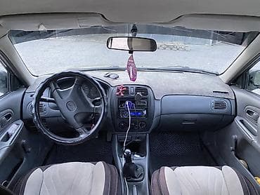 бампер мазда демио 2004: Mazda 323: 1998 г., 1.5 л, Механика, Бензин, Седан — 5