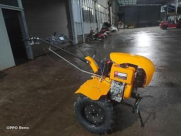 t 25: Мотоблок с бензиновым двигателем, желтый. Основные особенности: - — 1