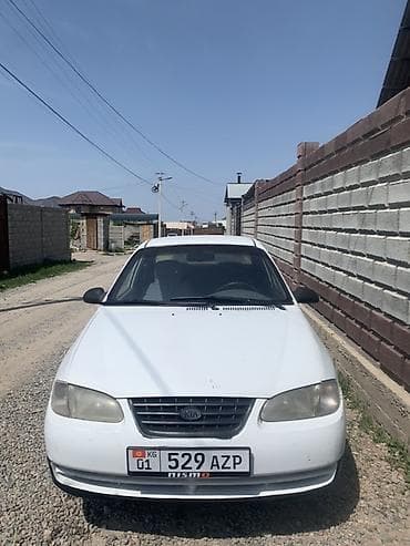 sprinter carib: Kia Avella: 1998 г., 1.5 л, Механика, Бензин, Седан — 1