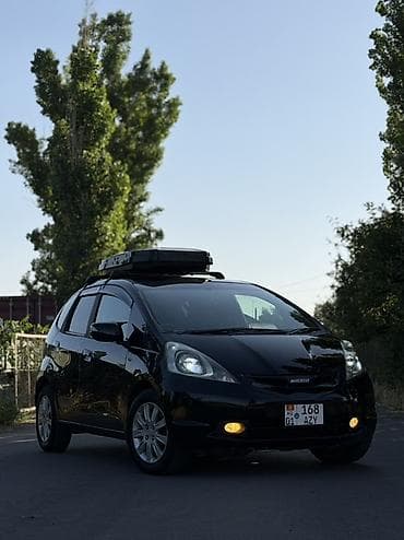 Унаа: Honda Fit: 2009 г., 1.3 л, Вариатор, Бензин, Хетчбек — 1