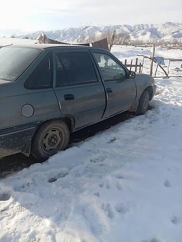 bmw 735i: Daewoo Nexia: 2001 г., Седан — 1