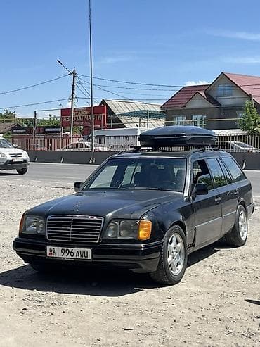 значок от мерса: Mercedes-Benz W124: 1995 г., Универсал — 3