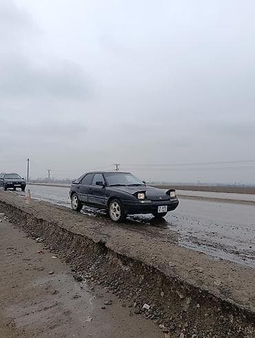 4a fe: Mazda 323: 1991 г., 1.8 л, Механика, Бензин, Хэтчбэк — 3