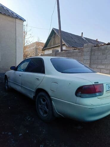 купить запчасти на опель вектра б: Mazda 626: 1992 г., 1.8 л, Механика, Бензиновая, Седан — 2