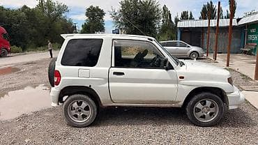 Транспорт: Mitsubishi Pajero iO: 1998 г., 1.8 л, Механика, Бензин, Внедорожник — 1