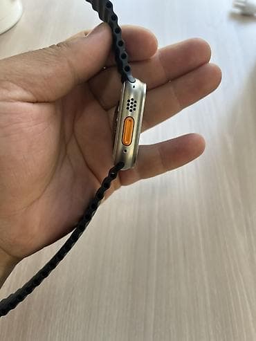 сколько стоит xs: Apple Watch Ultra (49 мм), титановый корпус, чёрный ремешок Ocean — 5