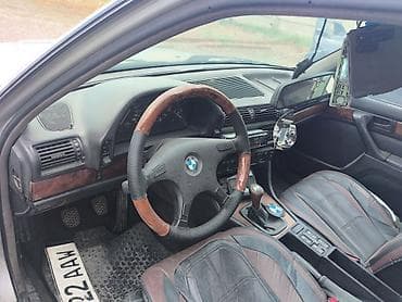 круглый: BMW 7 series: 1991 г., 3 л, Механика, Бензин, Седан — 10