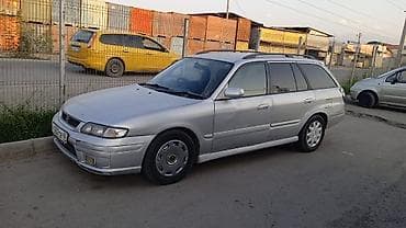 mazda demio вампер: Mazda Capella: 1998 г., Бензин, Универсал — 1