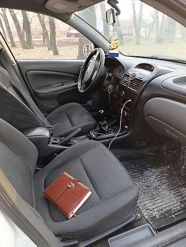 b class: Nissan Almera Classic: 2008 г., 1.6 л, Механика, Бензин, Седан — 9