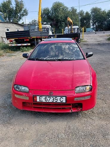 тканевый: Mazda Lantis: 1997 г., 1.5 л, Механика, Бензин, Хэтчбэк — 1