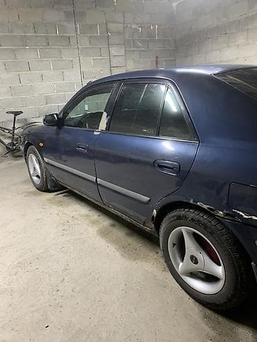 баткен ваз 2107: Mazda 626: 1997 г., Кол менен иштөөчү, Газ, Седан — 4