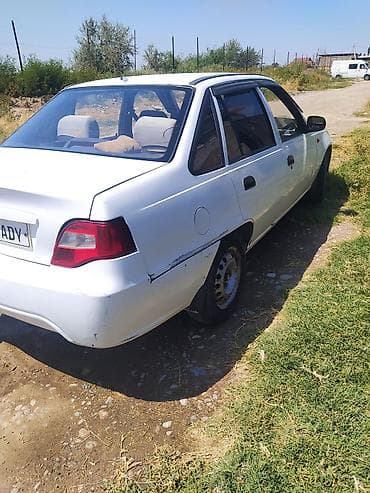 mersedes e: Daewoo Nexia: 2008 г., Механика, Седан — 3