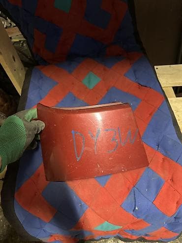 Автозапчасти: Накладка на бампер Mazda, Оригинал — 2