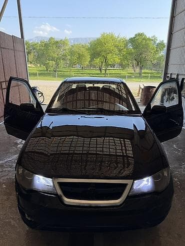 kia 2012: Daewoo Nexia: 2010 г., Ручные, Бензин, Седан — 4