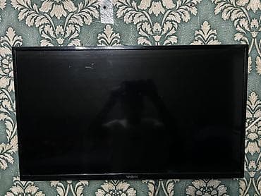 a 32: Телевизор VASIN, плоская панель, диагональ примерно 32–40". Подходит — 2