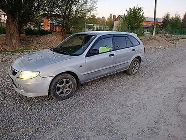 tyre master: Mazda 323: 2003 г., 1.3 л, Ручные, Бензин, Универсал — 1