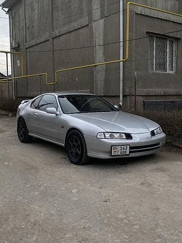 bmw m5 e34: Спортивное купе серебристого цвета с двухдверным кузовом и — 1