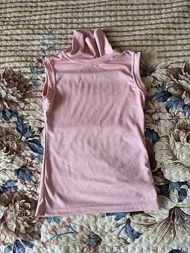 Безрукавка с высоким воротником-гольф, розовая. - Тип: трикотажная