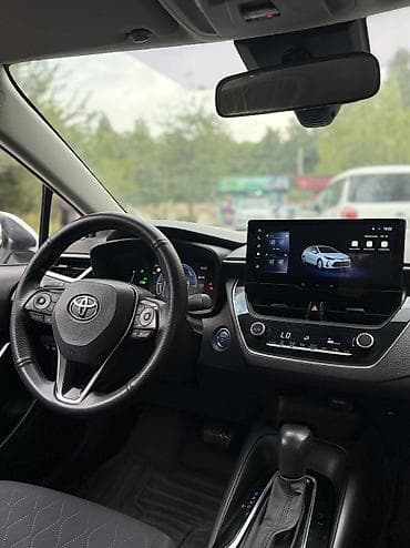 кочкор авто: Toyota Corolla: 2024 г., 1.8 л, Вариатор, Гибрид, Седан — 6