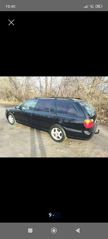 golf 1: Nissan Primera: 2000 г., 1.8 л, Универсал — 8