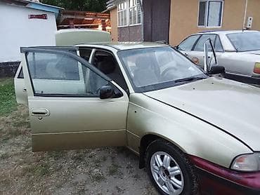 торг: Daewoo Nexia: 2005 г., Седан — 10
