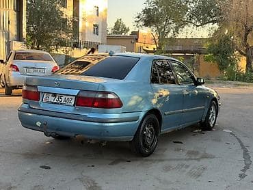 Mazda 626: 1999 г., 2 л, Кол менен иштөөчү, Бензин, Седан — 7