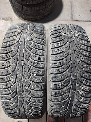 зимнее: Пара зимних шин (шипуемые) 215/55 R17 98T XL - Размер: 215/55 R17 - — 2