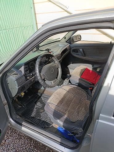 санта дн8: Daewoo Nexia: 2006 г., 1.5 л, Механика, Газ, Седан — 4