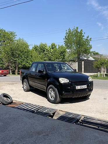 Пикап двойная кабина, черный цвет, 4 двери. Основные характеристики