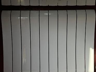 Биметаллический радиатор отопления, секционный. - Материал: стальной