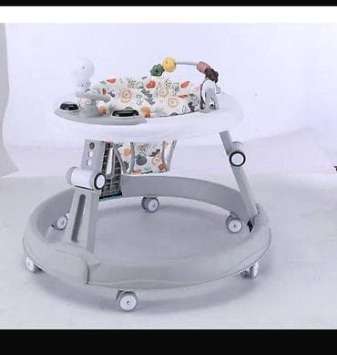 Детские ходунки с игровым столиком - Круглая устойчивая база с