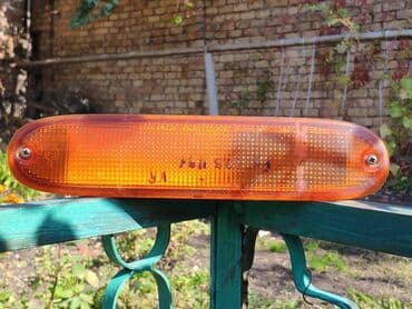 сколько стоят электронные часы: Правый поворотник Nissan 1994 г., Б/у, Оригинал, Япония — 1