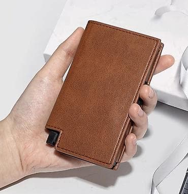 карман клаппан: Минималистичный кошелек-кардхолдер с выдвижным механизмом. - — 1