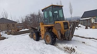 ом 605: Погрузчик, 2013 г., Колесный, Фронтальный — 1