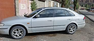 с4 2 3: Mazda 626: 1998 г., 1.8 л, Механика, Бензин, Хэтчбэк — 7