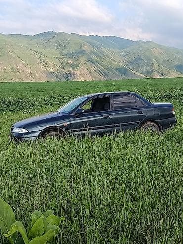 домкрат мазда: Mazda 323: 1999 г., Механика, Бензин, Седан — 7