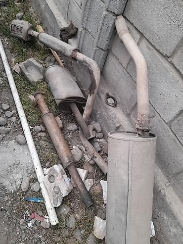 выхлопная система: Бампер Mazda, Б/у, Оригинал — 1