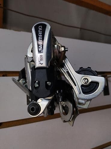 Велосипед тетиктери: Задний переключатель Shimano Tourney / SunRun Index для велосипеда — 1